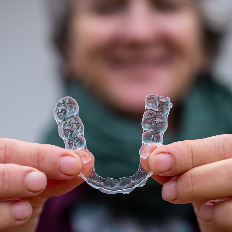 lady with mouthguard to use